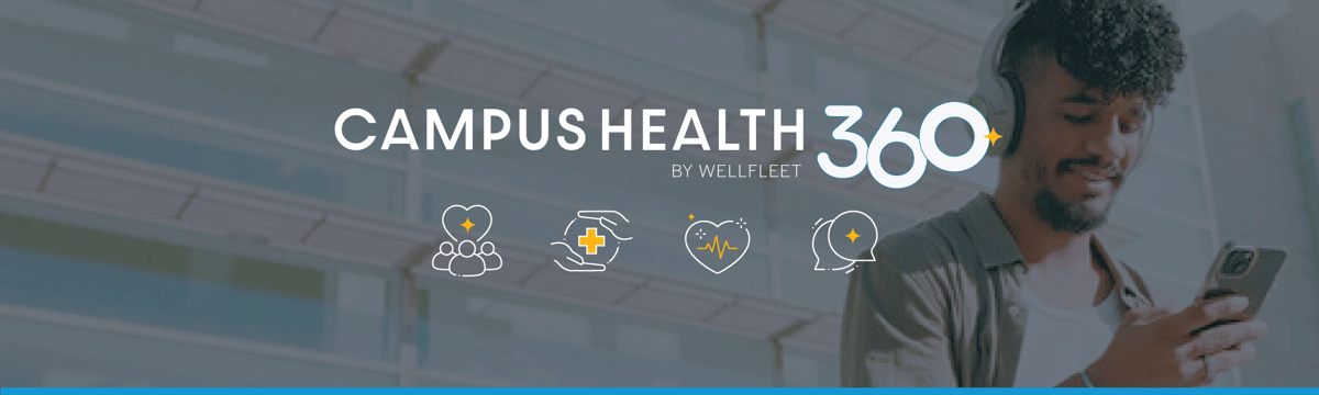 A student wearing headphones looking down at his phone.