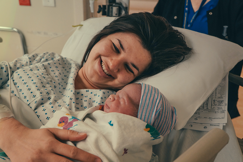 happy mom and newborn